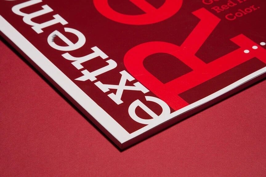 A close up of the letters on a red table